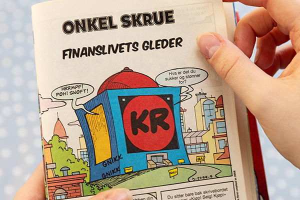 En side fra Donald Pocket som viser onkel Skrues pengebinge.