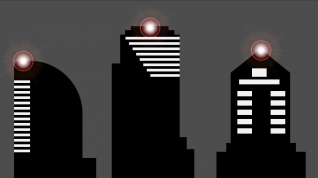 Tre skyskrapere med blinkende lys på toppen.